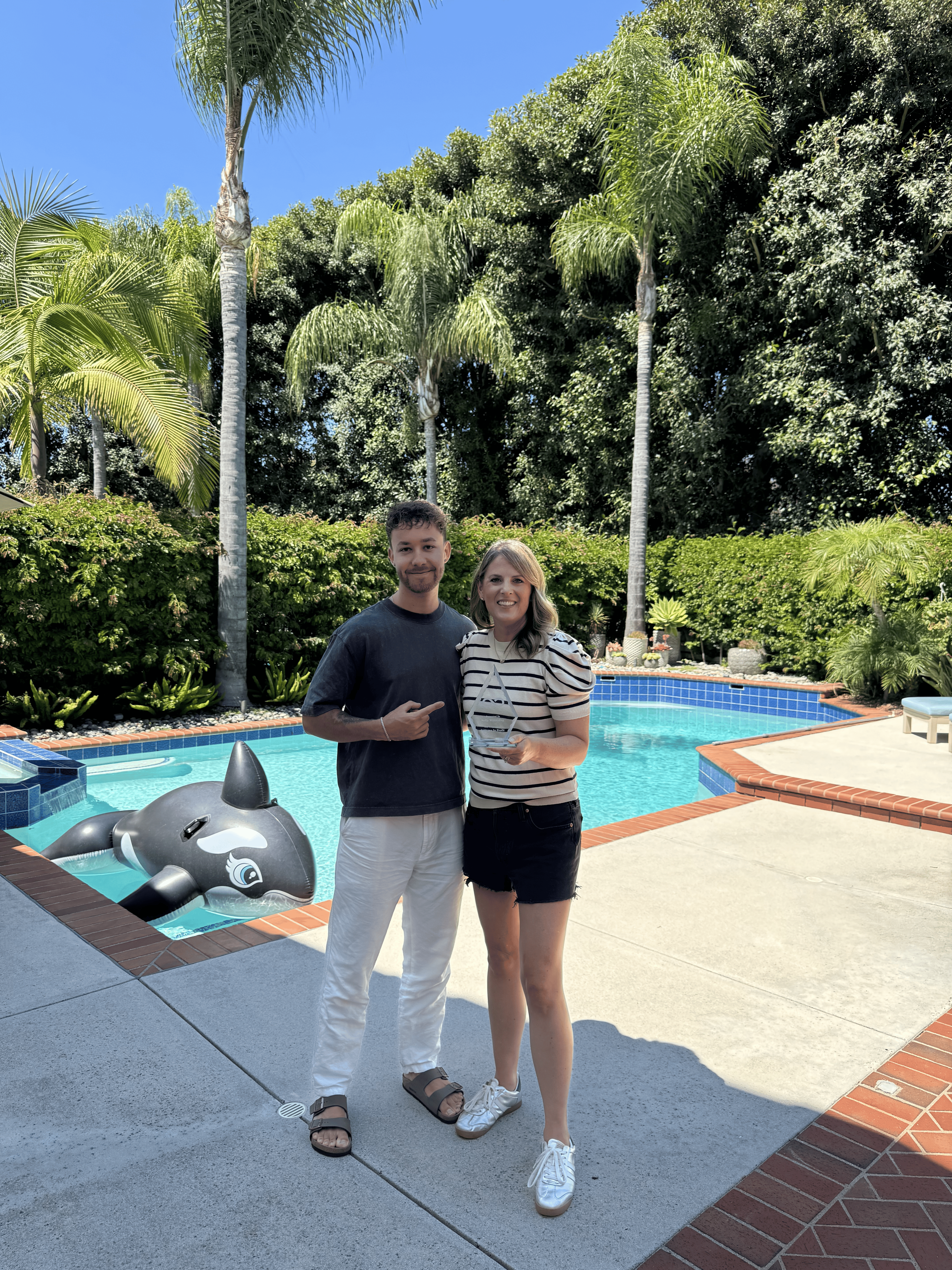 Kelly with Logan (trophy)